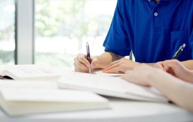 A caregiver studying for a qualification A caregiver studying for a qualification